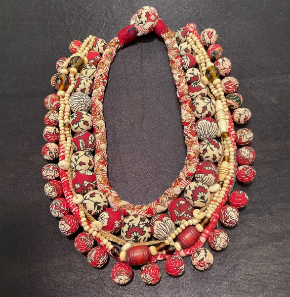 NECKLACE:  The Bhauna , hand made of embroidered beads, bone beads, braid, Choker length