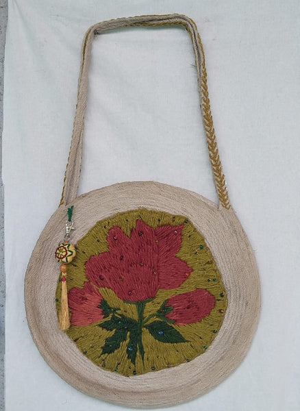 Shoulder Bag: Flower-embroidered coiled jute  with a locking closure