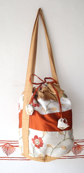 Shoulder Bag: Bucket or Cross body bag made out of Indian saree fabric, drawstring closure